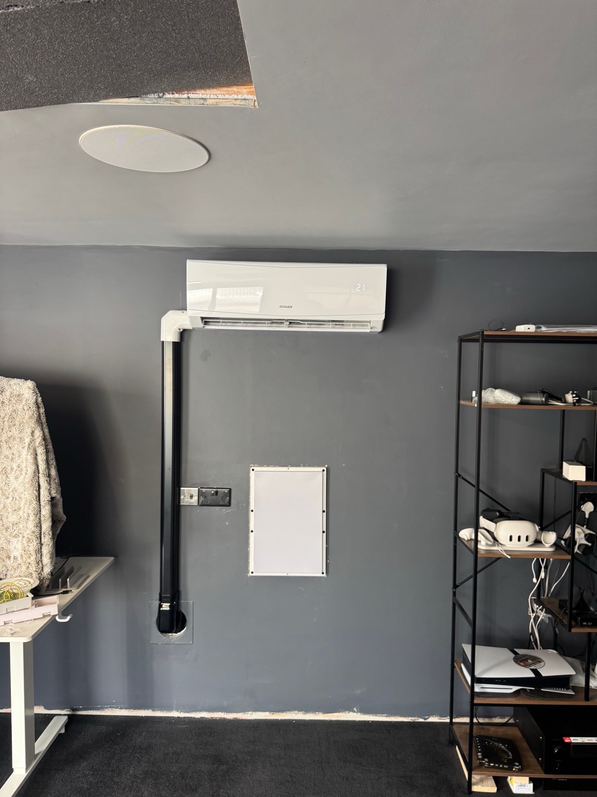 Sinclair 4.2kW wall mounted air conditioning unit fitted in a converted garage office in Timperley